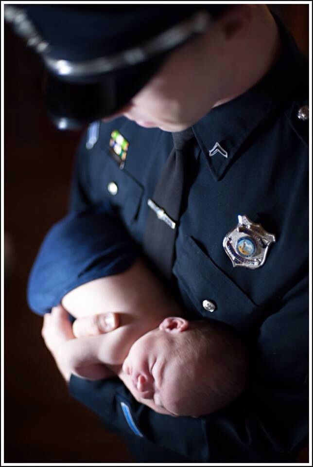 cop holding baby 2